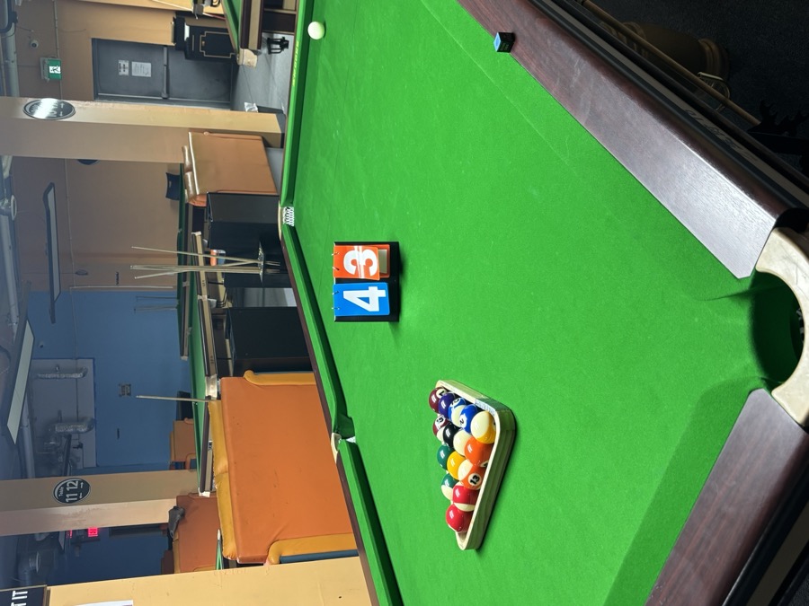 Close view of billiards table setup at 24Billiards.